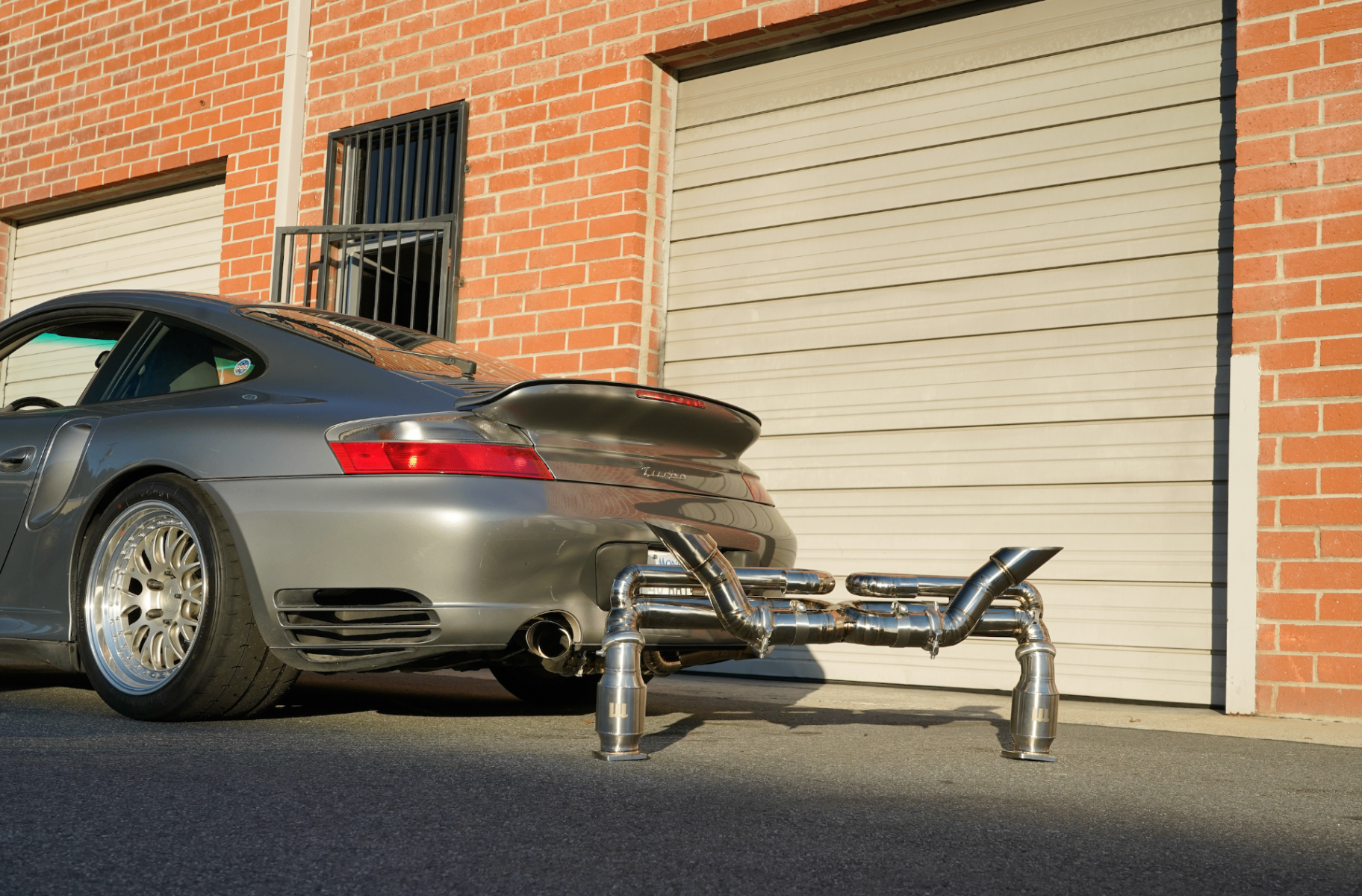 Meisterwerk slash-cut tip installed on a 996TT