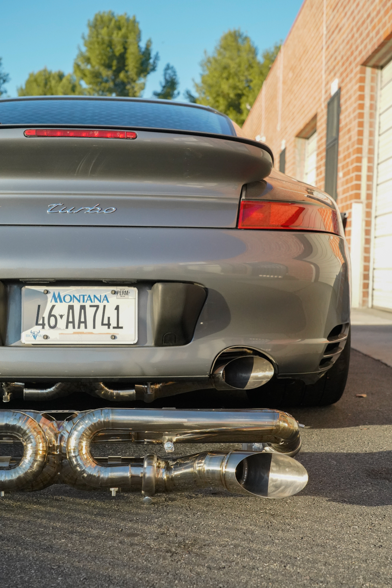 Rear view of a 996TT with Meisterwerk slash-cut tips and titanium exhaust